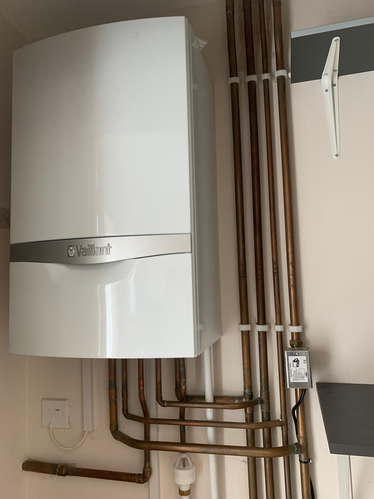 Vaillant boiler with neat copper pipework fitted by A S Plumbing and Heating